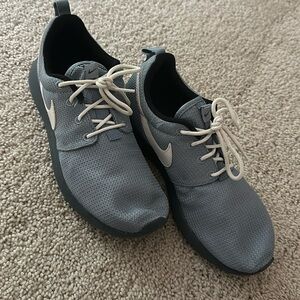 Size 6Y nike sneakers.  Gray